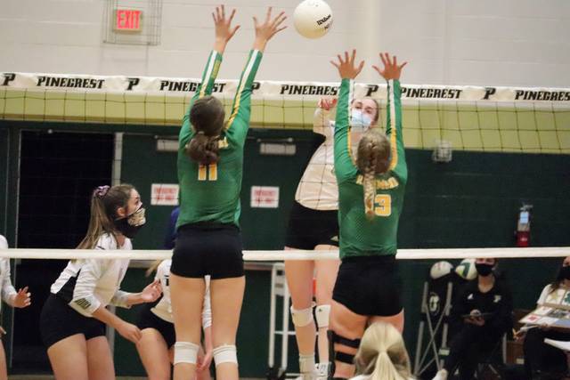 126030712_web1_VBpinecrest1
Seniors Georgia Grace Anderson and Shelly Hoffman go up for a block during Thursdays loss to Pinecrest in Southern Pines.
Neel Madhavan | Daily Journal