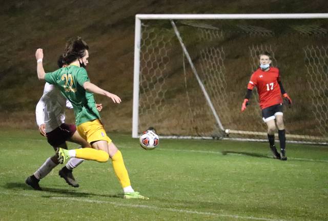 126577515_web1_RichmondBoysSoccerLumberton1
Junior forward Luke Williams winds up for a shot in the first half Wednesday night against Lumberton.
Neel Madhavan | Daily Journal