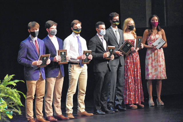 
			
				                                Photo courtesy of Richmond County Schools
                                Summa Cum Laude students received plaques for their achievement.
 
			
		