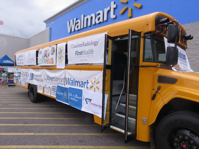 127408688_web1_IMG_3463
Volunteers from the Richmond Senior High School National Honor Society, RSHS Beta Club, Planet Fitness and the Richmond County Chamber of Commerce helped buy supplies for this years Stuff the Bus. There were 53 sponsors, which United Way of Richmond County Executive Director Michelle Parrish said is the most theyve had in their 13-year history. They raised a total of $9,000. Weve had great community support, Parrish said. The supplies will be distributed this week in anticipation of the upcoming school year.
Matthew Sasser | Daily Journal