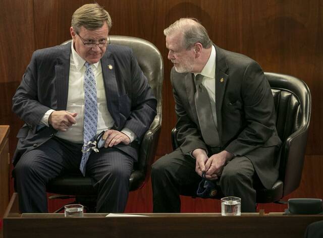127682805_web1_APbudget
Robert Willett | The News & Observer via AP, File
In this April 26, 2021, file photo, House Speaker Tim Moore, left, talks with Senator Phil Berger in Raleigh, N.C. The North Carolina House on Thursday, Aug. 12, 2021, approved a two-year budget with enough support to thwart a potential veto from Democratic Gov. Roy Cooper.