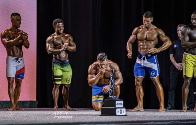 
			
				                                This is the moment that Cox found that he won not only his pro card, but won overall for the men’s physique division. “All that emotion hit me at once,” Cox said. “It was like a weight was lifted off of me. It was an amazing day that I’ll never forget.”
                                 Photo contributed by Tom and Helen Cox

			
		