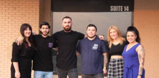 
			
				                                Owner Daniel Sweatt, third from left, and associates outside of Headlines hair salon in Richmond Plaza.
                                 Matthew Sasser | Daily Journal

			
		