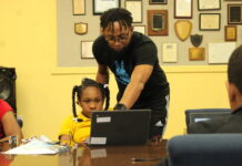
			
				                                Jeff Epps helps Tiyah Wall with a micro:bit programming lesson.
                                 Matthew Sasser | Daily Journal

			
		