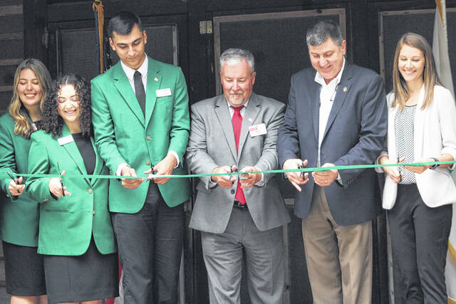 128502187_web1_IMG_4727
The ribbon is cut at the new Farm Credit Dining Hall at Millstone 4-H Camp in Ellerbe.
Matthew Sasser | Daily Journal