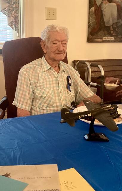 129917166_web1_bill-brookshire-1
Bill Brookshire, 99, sits in front of a replica of a B-17 Flying Fortress, similar to the one he and his crew flew 25 missions over Germany.