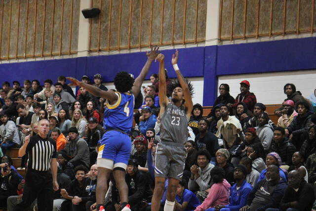 130129748_web1_IMG_6641
St. Andrews Jalen Mcafee-Marion (23) shoots a 3 over Morris Charles Morgan (4) during a Nov. 1 game at Harris Court in Laurinburg.
File photo