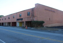 
			
				                                The former Woods Warehouse at the corner of South Hancock Street and Mill Road may potentially be converted in a up to 35-unit apartment building.
                                 Matthew Sasser | Daily Journal

			
		