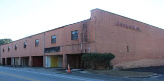 
			
				                                The former Woods Warehouse at the corner of South Hancock Street and Mill Road may potentially be converted in a up to 35-unit apartment building.
                                 Matthew Sasser | Daily Journal

			
		