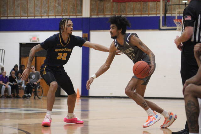 130369130_web1_IMG_8273
St. Andrews Jalen Mcafee-Marion (23) drives as Reinhardts Nekhi Fisher (32) defends during Saturdays game on Harris Court in Laurinburg.
Brandon Hodge | The Laurinburg Exchange