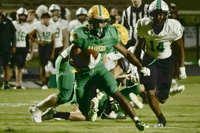 130927530_web1_converted_66edd5659787b
Javion Smith breaks loose for a double-digit gain last Friday. Scan the QR code to catch up on last Fridays game, including a video of the game and a photo gallery from the game.